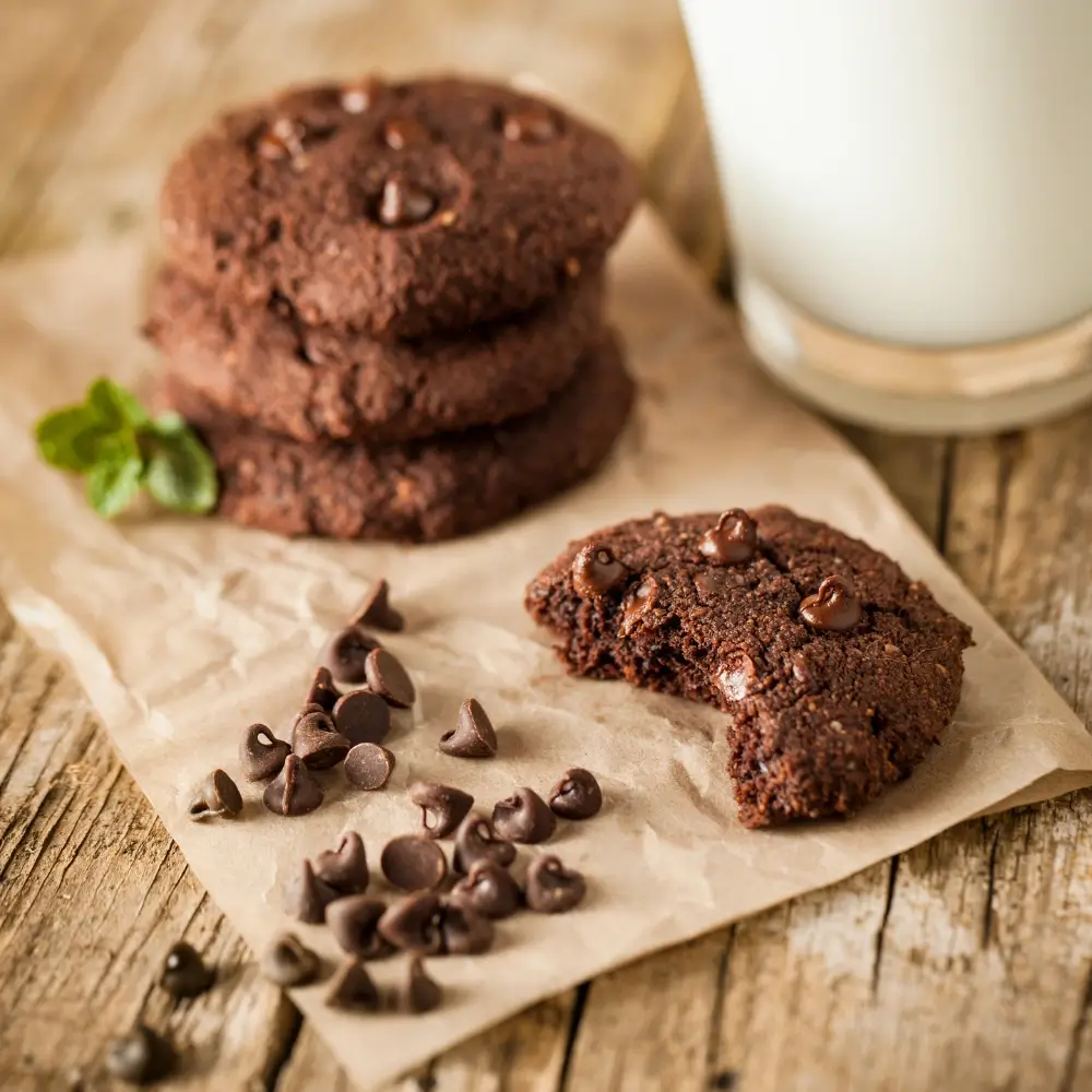 A plate of double chocolate cookies, rich and chewy with gooey chocolate chunks, perfect for chocolate lovers.