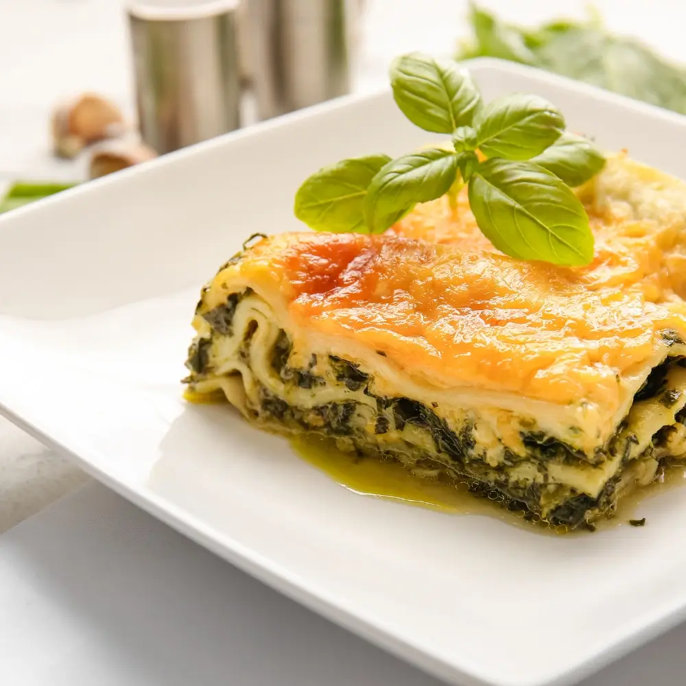 A hearty serving of Barilla lasagna, with layers of pasta, rich marinara sauce, melted mozzarella, and Parmesan cheese, baked to perfection.