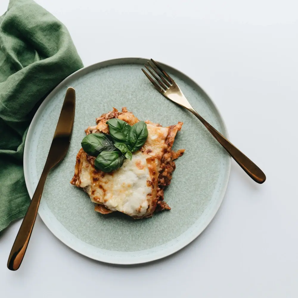 A hearty serving of Barilla lasagna, with layers of pasta, rich marinara sauce, melted mozzarella, and Parmesan cheese, baked to perfection.